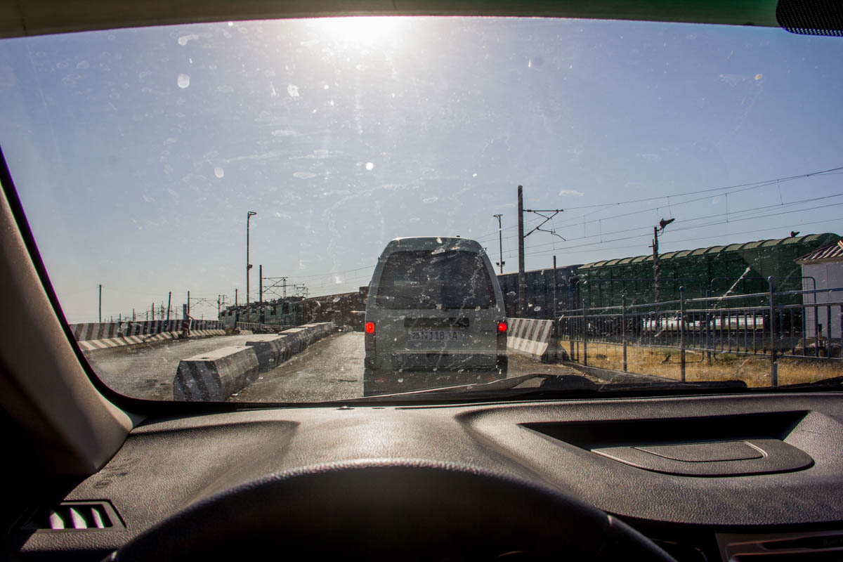 Going places. Waiting for the train to pass...