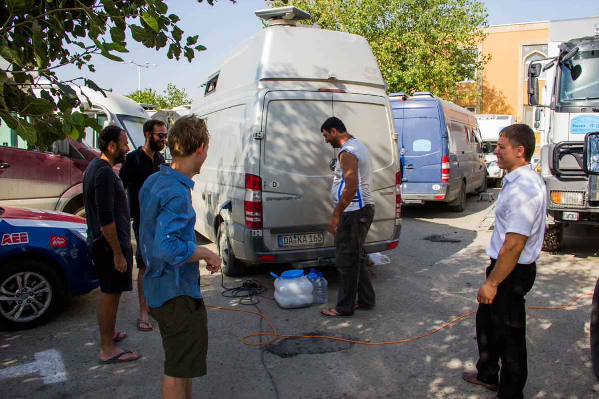 Our car got 'parked in' by 20 (mostly) German camper-vans. Thankfully an Uzbek rally driver helped us out and managed to maneuver us out of this remarkable situation...  
